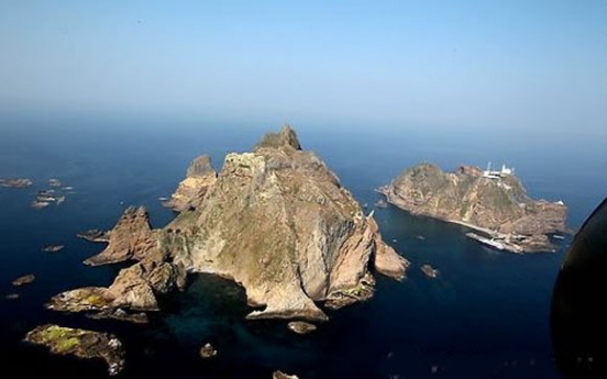 Japan extends claims to Dokdo in high-speed train poster