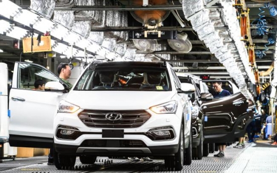 Labor costs at carmakers among highest last year