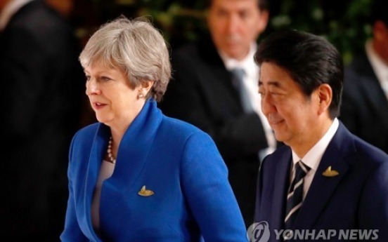 UK PM 'outraged' by N. Korea missile ahead of Japan trip