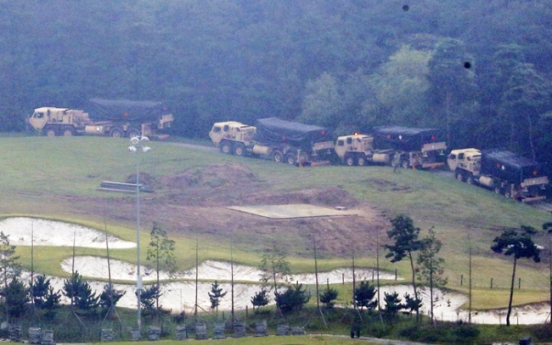 THAAD launchers enter US base amid protests