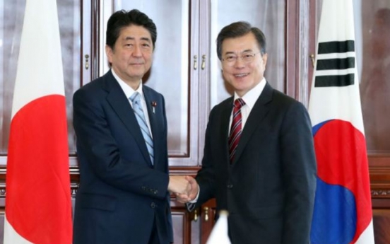 Moon, Abe denounce N. Korean nuke test, vow join efforts