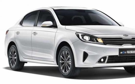 Kia unveils new sedan in China amid tension ease