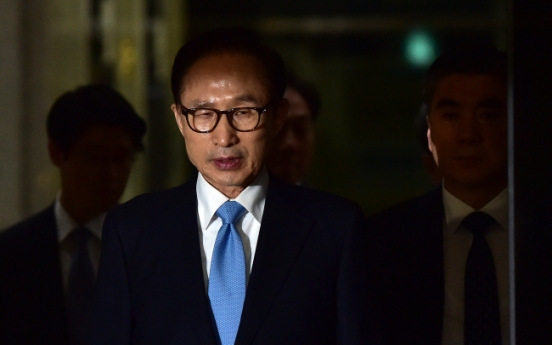 Ex-President Lee admits to receiving illicit money from state spy agency