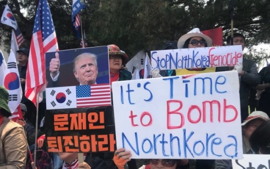 [From the scene] Rightwing protestors claim ‘time to bomb NK’