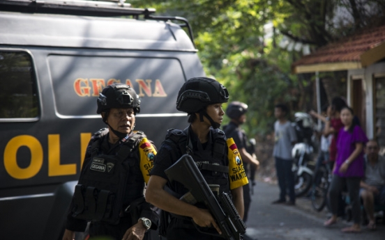 At least two dead, 13 injured in Indonesia church attacks: police