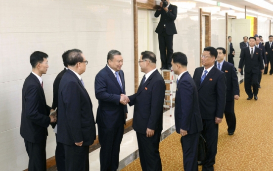 NK party officials visit China