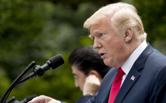 Trump says 'looking forward' to resolving trade disputes at G7