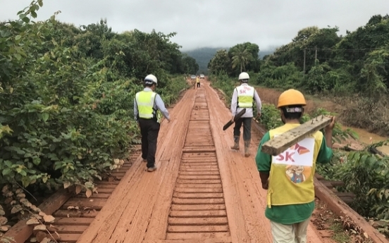 SK E&C mends road in Laos after dam collapse