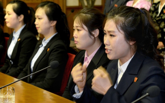 S. Korea rights body meets North's waitress 'defectors' in probe