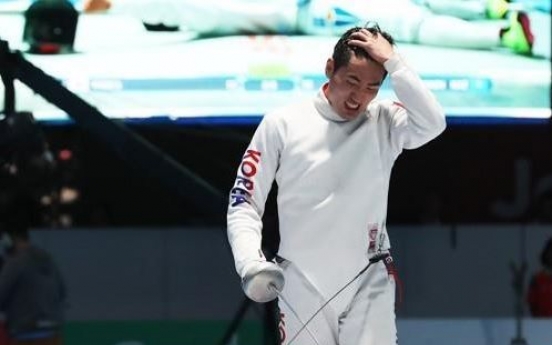 Ex-Olympic champ fencers chase team gold after losing individual titles
