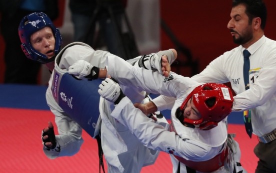 Taekwondo fighter Lee Hwa-jun wins silver in men's 80kg
