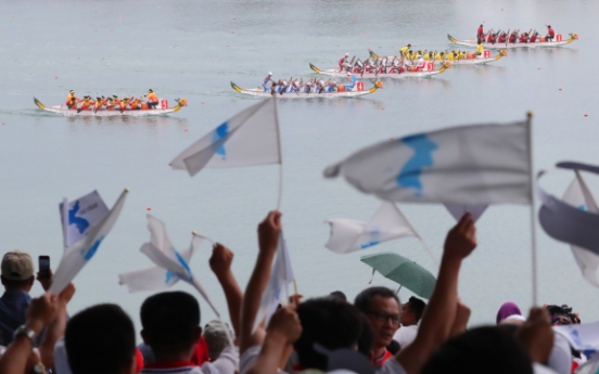 Unified Korean canoeing team wins gold in women's 500m dragon boat racing