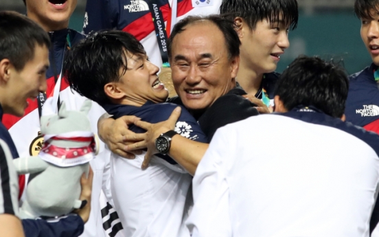 S. Korean football coach says gold medal victory made by players