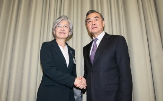 Kang holds bilateral talks with Chinese, Japanese counterparts over peninsula peace