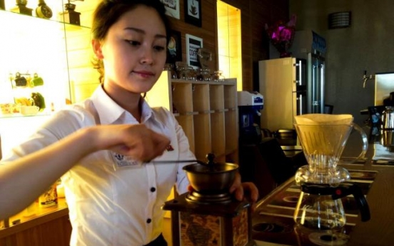 [Newsmaker] Ordinary North Koreans join elite in acquiring taste for coffee