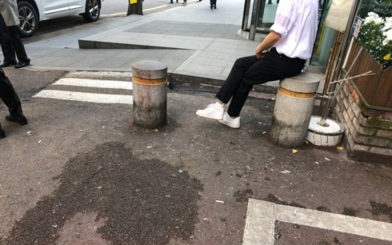 [Feature] Why do people spit on streets in Korea?
