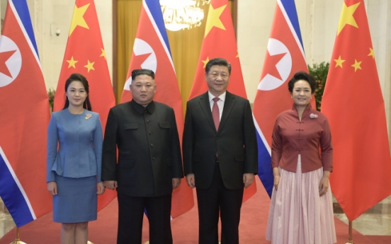 Kim reaffirms commitment to denuclearization in meeting with Xi