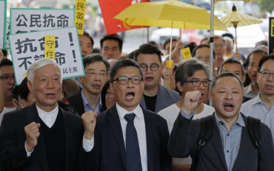 Hong Kong democracy leaders await Umbrella Movement verdict