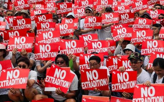 Violence mars end of huge Hong Kong protest against China extradition