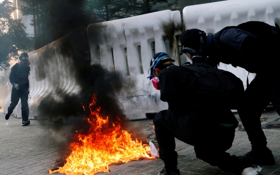 Violence flares after Hong Kong protesters defy police ban