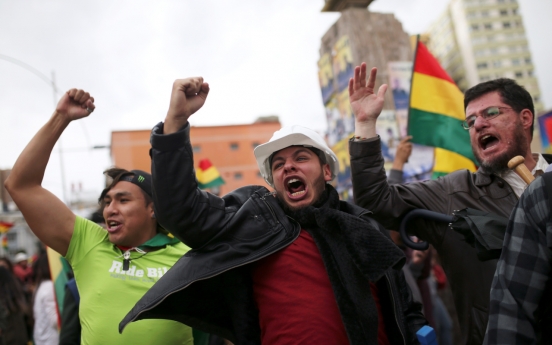 Bolivia's Morales resigns after losing backing of security forces