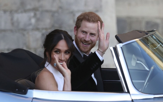 Britain's Prince Harry and Meghan to give up royal titles