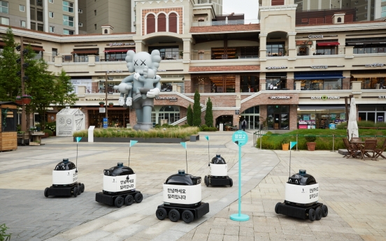 Baemin introduces first outdoor delivery robot in apartment complex