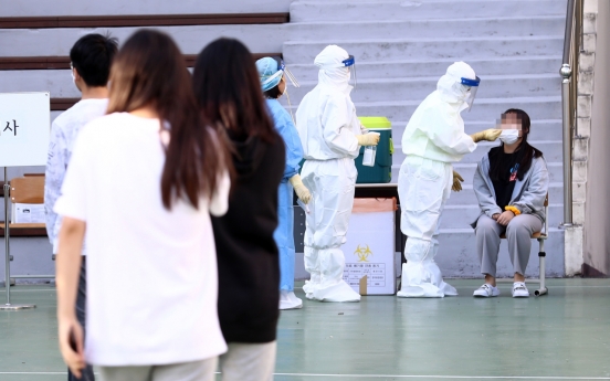 S. Korea’s daily COVID-19 cases back in triple digits