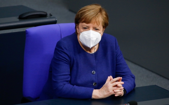 Merkel urges tougher curbs as virus deaths soar