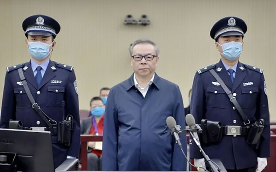 Former head of China state asset firm sentenced to death
