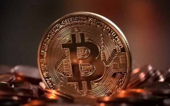 Bitcoin falls most in a month on worries prices are excessive