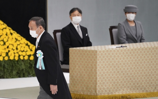 Japan ministers visit controversial shrine on WWII anniversary