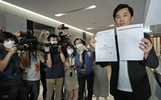 Hong Kong 'patriot' committee removes opposition lawmaker from office