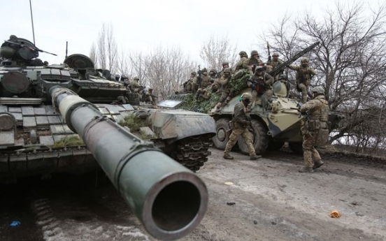 Russian invasion convoy masses near Ukraine capital