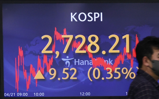 Seoul shares end higher on chip advance
