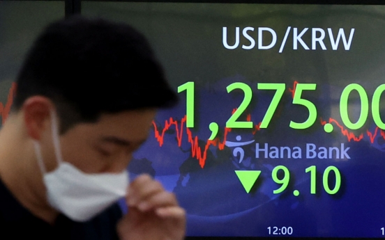 Seoul shares up nearly 1% as investors buy beaten-down issues
