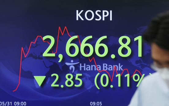 Seoul shares open tad lower amid continued recession woes