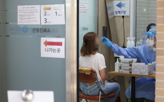 S. Korea's new COVID-19 cases drop below 100,000