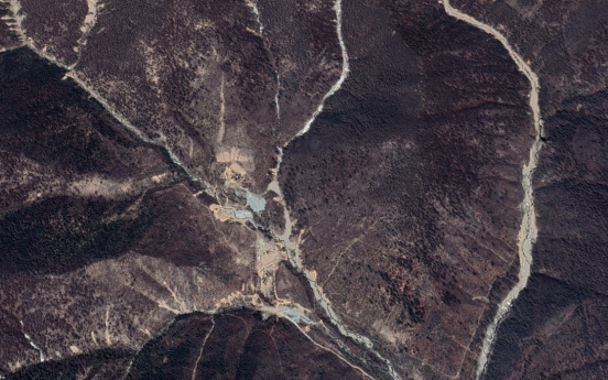 After heavy rains, N. Korea stops reenabling tunnel at nuclear test site: satellite imagery