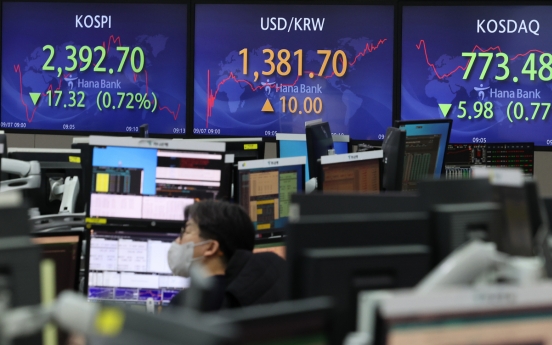 Seoul shares open lower on US losses; local currency plunges
