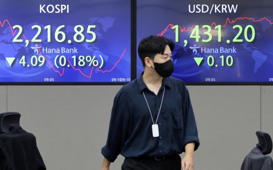 Seoul shares open tad higher after Monday's plunge