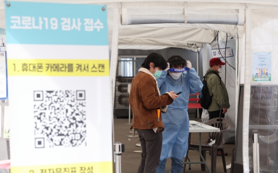 <b>S</b>. Korea'<b>s</b> new COVID-19 cases swell to 71,000 amid worries over another virus wave