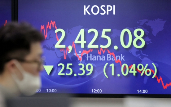 Seoul stocks end lower ahead of Fed's rate decision
