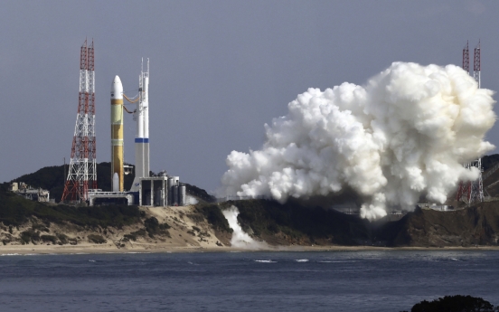 Japan aborts launch of new rocket carrying missile sensor