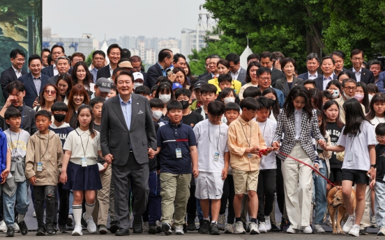 Yoon celebrates opening of children's garden on ex-US military base