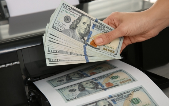 Woman booked for exchanging counterfeit US dollars