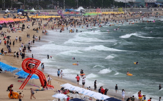 Korean workers feel the pinch, half not planning summer vacation