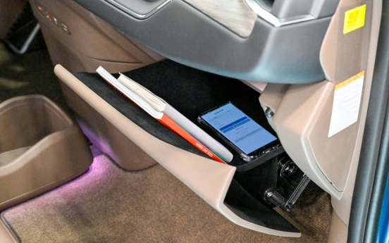 Hyundai Mobis supplies overhead bin-shaped glove compartment for Kia EV9