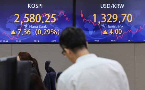 Seoul shares open higher amid hope for Fed's rate hike pause