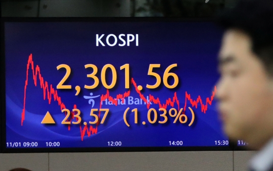 Seoul shares open higher on Fed's rate freeze